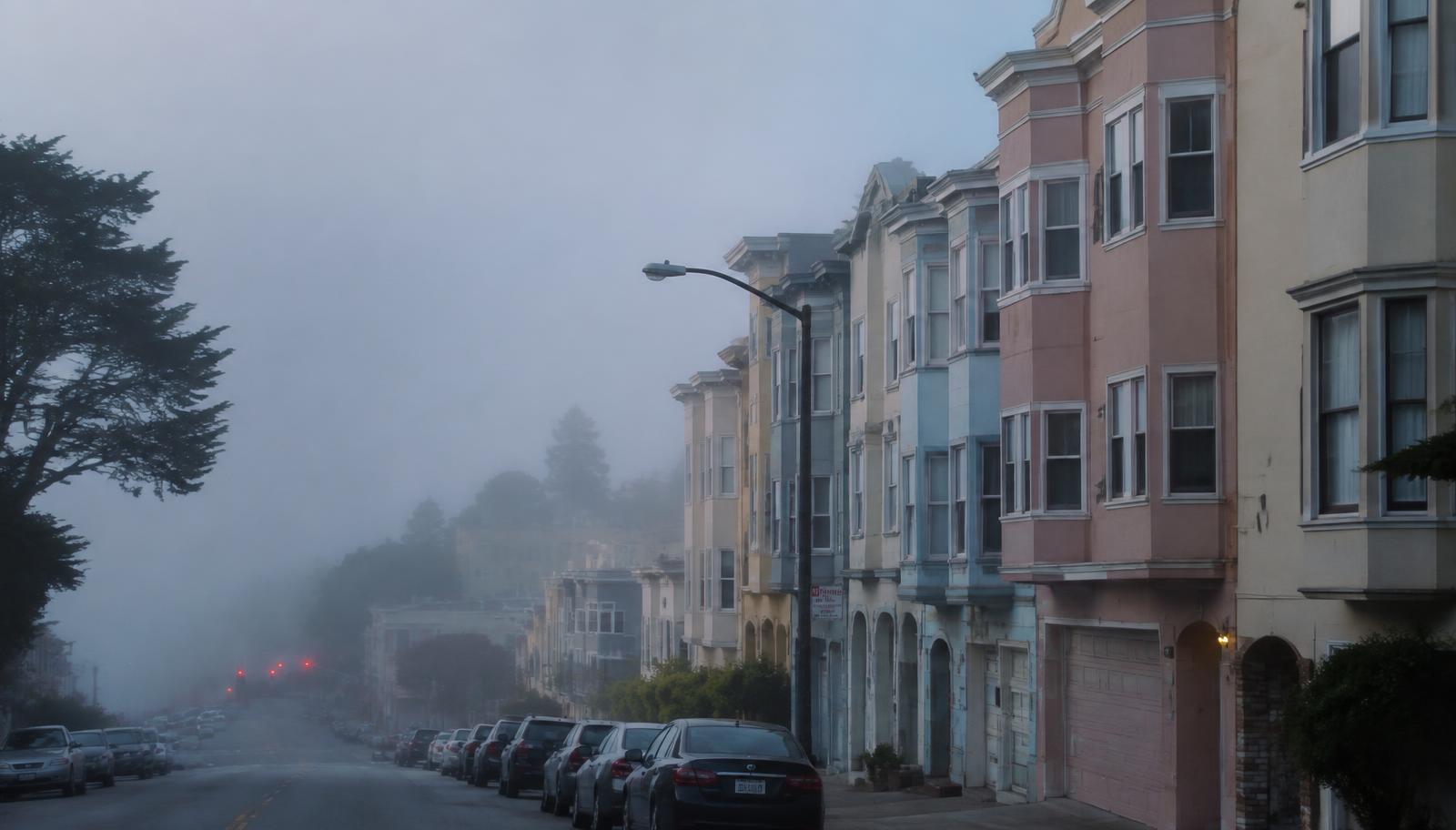 Fog rolling over Bay Area homes. Coastal neighborhoods stay humid through much of the summer.